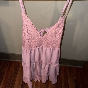 Skinny strap, with a low back, flowy, lace dress from Francesca’s.